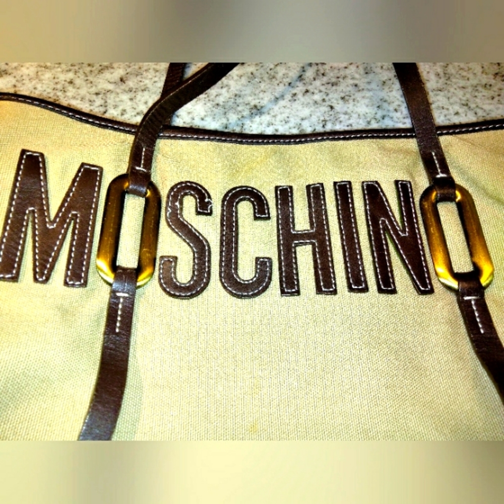 Moschino authentic canvas and leather trim tote bag.